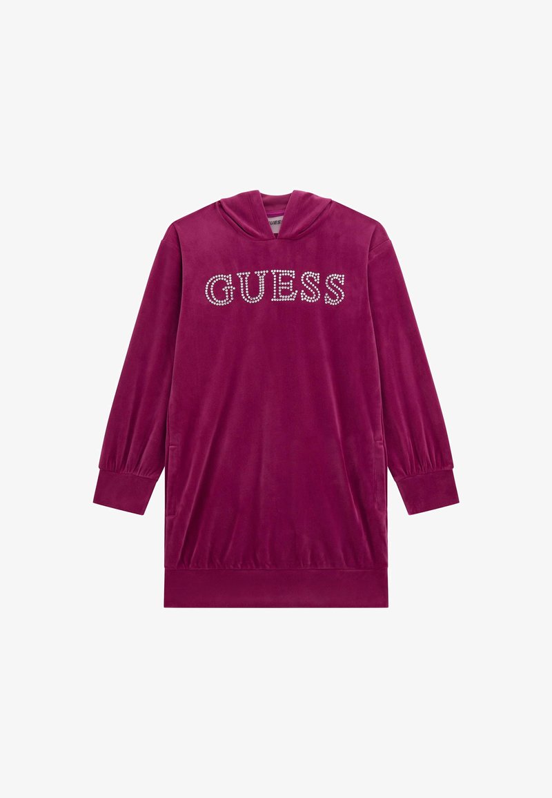 Fuksijos veliūro džemperinės suknelės ilgomis rankovėmis, su šonkauliniais rankogaliais, ir žodžiu "GUESS" deimantėliais ant krūtinės. Minkšta, struktūruota medžiaga.