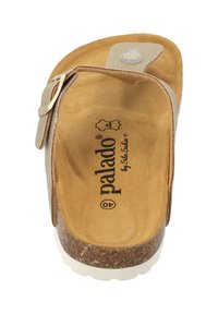 Sandalo Palado con tomaia in pelle beige, plantare in sughero marrone e suola in gomma bianca. Presenta un accentuato in metallo e il logo del marchio all'interno.