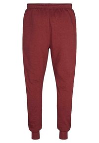 Burgundy fleece joggingbyxor med elastisk midja, smalnande ben och ribbade ärmslut. Slät textur utan synliga mönster eller detaljer.