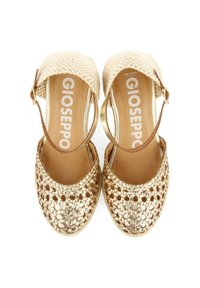 Sandalias de esparto tejidas en dorado con una tira de ganchillo color beige y hebilla ajustable en el tobillo. Plantilla suave color marrón claro con el logo de la marca.