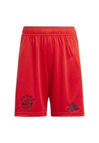 Punaiset urheiluhaalarit, joissa on joustava vyötärö, mustalla FC Bayern München -logolla ja mustilla Adidas-raidoilla vasemmassa jalassa.