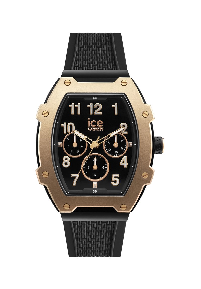 Orologio con cinturino in gomma nera e cassa ottagonale color oro. Il quadrante nero presenta grandi numeri dorati e tre sottomisure. Logo "ice watch" visibile.