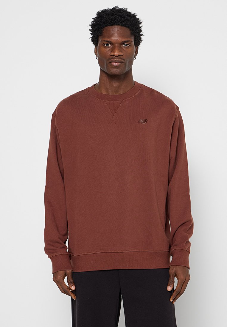 New Balance Sweater bruin New Balance Sweater bruin