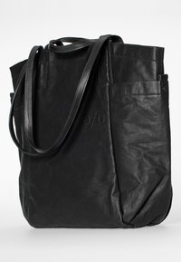 Black leather tote bag with two long shoulder straps and side pockets, featuring subtle embossed brand initials on the front.