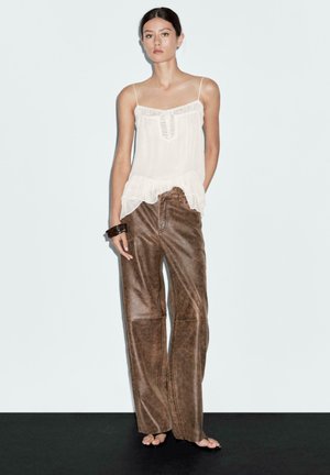 Rank 3: Massimo Dutti - DISTRESSED NAPPA FINISH WITH WORN EFFECT - Leather trousers