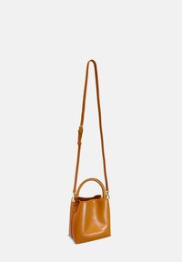 Small orange leather handbag with a structured shape, featuring a short handle and a long adjustable strap. Simple design with a smooth texture.