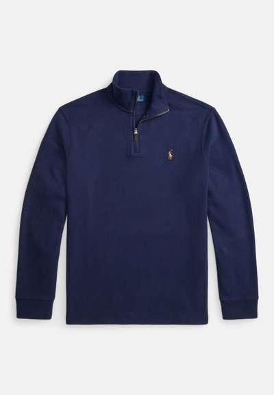 Navy blue long-sleeve pullover with quarter-zip collar and small embroidered polo player logo on the left chest.