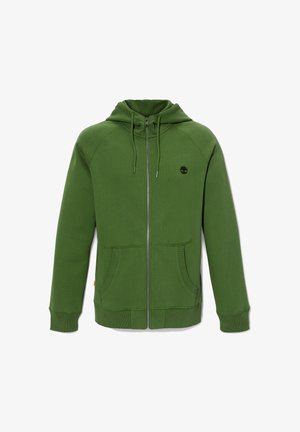 Felpa verde con zip realizzata in cotone. Presenta un cappuccio con cordino, due tasche frontali e un piccolo logo nero sul petto.