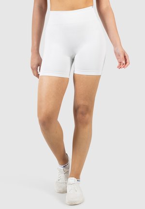 Witte rekbare fietsbroekjes met een hoge tailleband en een gladde textuur. Heeft een eenvoudig ontwerp zonder zichtbare patronen of hardware.