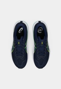 Navy running shoes with a textured upper, white sole, green and yellow accents, and flat laces, designed for comfort and performance.