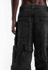FAVELA MULTI POCKET UNISEX - Relaxed fit jeans - black