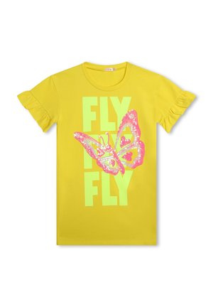 Gul bomullströja med volangärmar, som har en rosa glittrande fjärilsgrafik och texten "FLY" i tjocka gröna bokstäver.