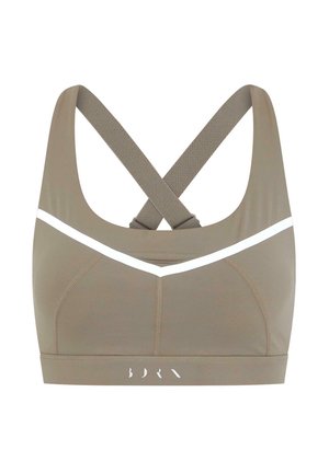 Soutien-gorge de sport dans une teinte brun discret avec un accent en chevron blanc. Dispose de bretelles croisées et d'un tissu lisse pour le confort et le soutien.