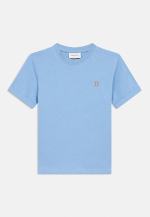 Light blue short-sleeve cotton t-shirt with crew neck, small orange "II" logo on the left chest, and "LES DEUX" label inside collar.