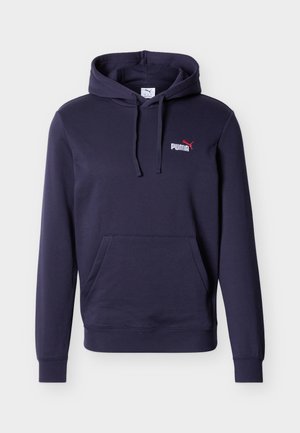 Temno modra kapucar s sprednjim žepom v slogu kenguruja, kapuco z vrvico ter belim logotipom Puma z rdečim emblemom pume na levi prsni strani.