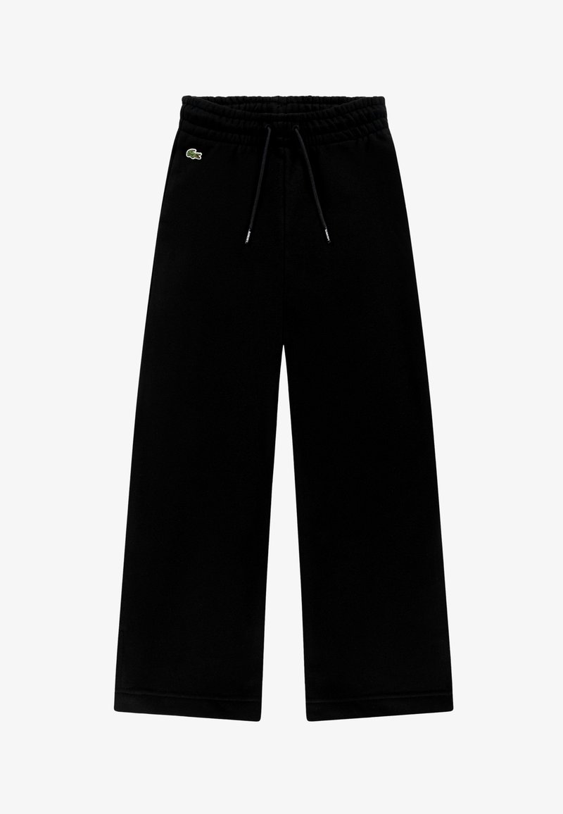 Pantalon noir à jambes larges avec taille élastique et cordon de serrage, arborant un petit logo crocodile vert sur la hanche gauche.