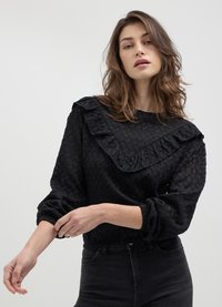 Calliope TRAFORATA CON ROUCHES - Maglione - nero