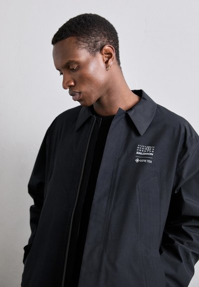 MM6 Maison Margiela SALOMON - Casaco impermeável - black