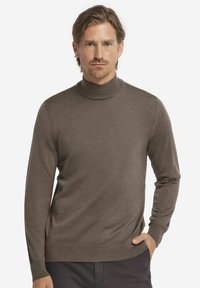 Brauner Rollkragenpullover mit langen Ärmeln, aus einem weichen Stoff gefertigt; hat ein tailliertes Design und einen gerippten Saum.