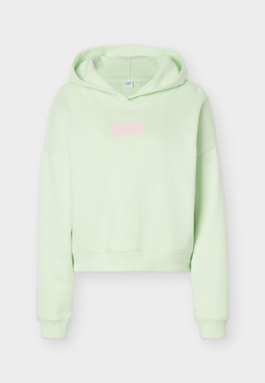 Φωτεινό πράσινο cropped φούτερ με μακριά μανίκια και κουκούλα, με τη λέξη "GAP" σε ροζ γράμματα στο κέντρο μπροστά.