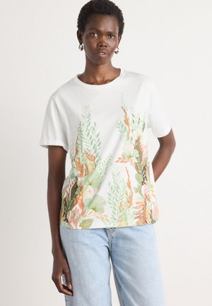 White cotton t-shirt featuring colorful floral and leaf prints in greens, oranges, and yellows; round neckline and short sleeves.
