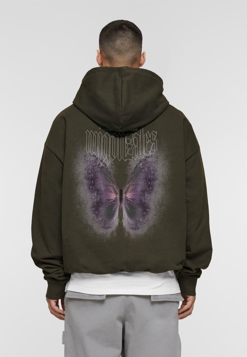 Olive green hoodie featuring a large purple butterfly graphic on the back, with textured fabric and a relaxed fit.