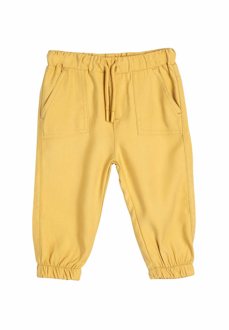 Gule bomuldsbukser med elastisk talje, justerbar snor og to frontlommer; elastiske manchetter ved anklerne.