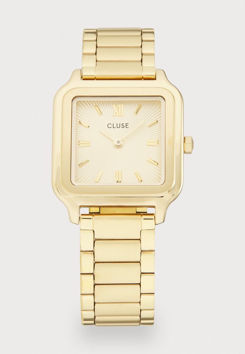 Χρυσό-τονωμένο τετράγωνο ρολόι χειρός με μεταλλική αλυσίδα, ρωμαϊκοί αριθμοί ωρών και το όνομα της μάρκας "CLUSE" στη διακόσμηση ήλιου του καντράν.