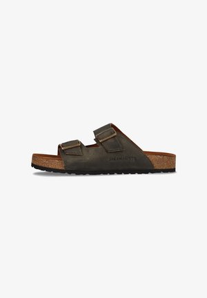 Brown leather sandals with two adjustable straps, a cork footbed, and a textured black rubber sole; "SALAMANDER" logo embossed on the side.