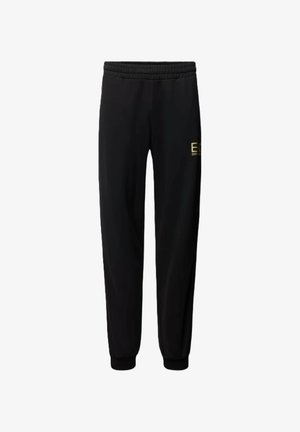 Pantaloni da jogging neri con vita elastica, caviglie arricciate e un logo dorato sulla coscia. Tessuto morbido e design affusolato.