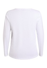 Ilgas rankovėmis baltas marškinėlis iš minkštos medžiagos. Turi apvalią apykaklę ir lygią tekstūrą, su paprastu, nepuoštu dizainu.