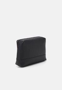 Tommy Hilfiger TRANSIT POUCH - Kosmetická taška - black