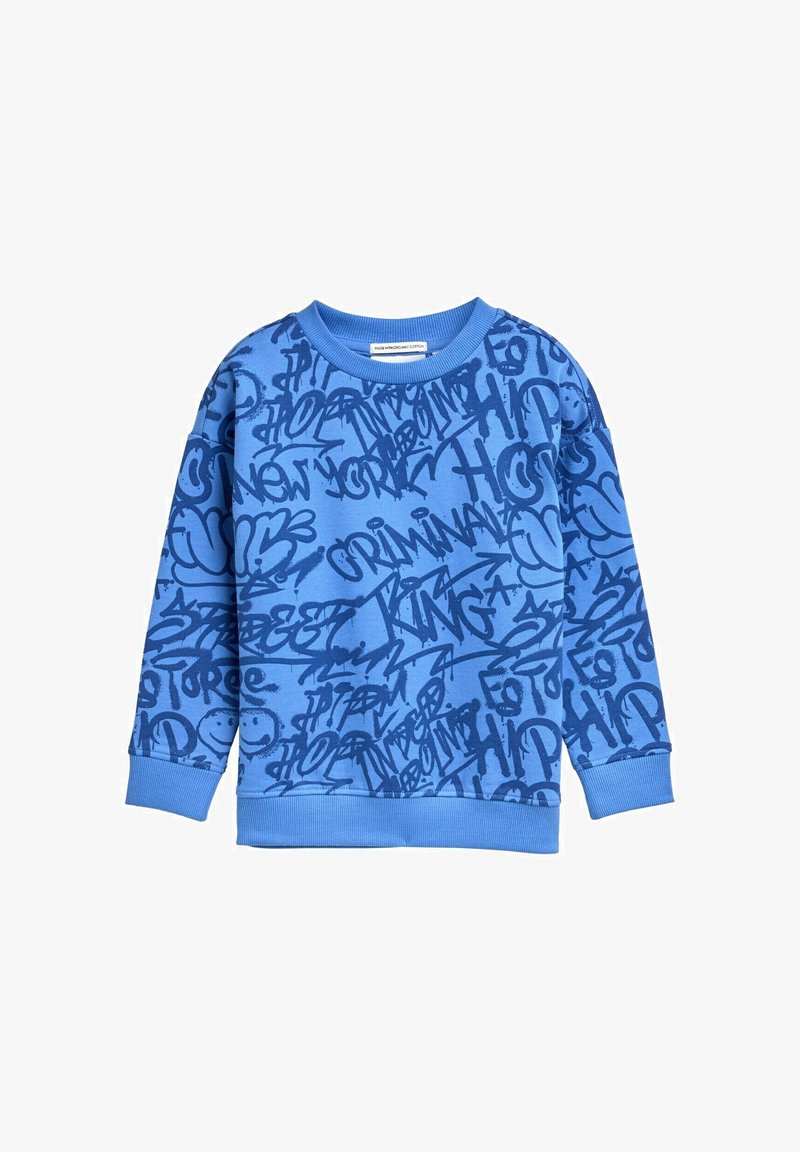 Felpa a maniche lunghe blu con testi e design in stile graffiti blu scuro, comprese parole come "criminale" e "re" in vari caratteri.