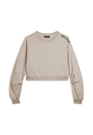 Sudadera corta beige hecha de una tela suave, con mangas largas, escote redondo y detalle del logotipo negro en el hombro.