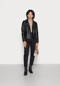 Dr.Denim Petite NORA  - Calças de ganga de corte relaxado - washed black stretch