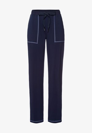 Pantaloni lounge blu navy con vita regolabile, due tasche frontali e cuciture a contrasto lungo le tasche e gli orli. Realizzati in tessuto morbido.