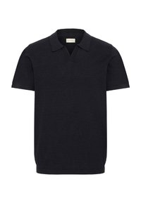 Polo manches courtes bleu marine avec col en V, confectionné en tissu doux, présentant un col classique et un design épuré et minimaliste.