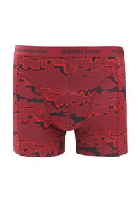 Rode boxershort met een wolkachtig zwart patroon, elastische tailleband met het merk "BJÖRN BORG," aansluitend ontwerp en een gladde textuur.