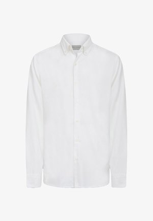 Camicia bianca a maniche lunghe con bottoni, realizzata in tessuto morbido, con colletto classico e chiusura con bottoni, maniche con polsini e orlo dritto.