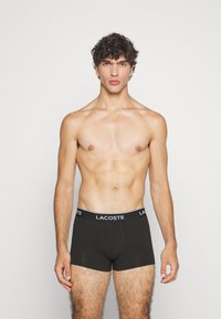 Lacoste 3 PACK - Chiloți boxer - jaune fluo/bleu/noir