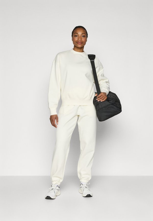 STUDIO SWEATPANTS - Tracksuit bottoms - cannoli cream4