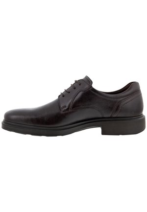 Zapato de vestir de cuero marrón con superficie lisa, puntera redondeada, seis ojetes y suela de goma para tracción. Detalle de costura lateral visible.