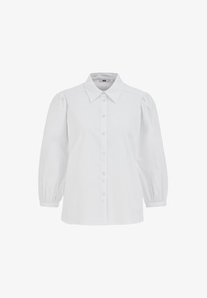 Fehér ing, gombos, gallérral, fodros ujjakkal és gumis mandzsettákkal. Puha anyagból készült, sima textúrával és tiszta dizájnnal.