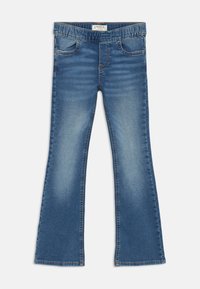 Blaue Jeans im Schlagstil aus Denim mit elastischem Bund, zwei Fronttaschen und verblassten Waschdetails an Oberschenkeln und Knien.