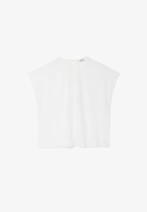 Blouse blanche à manches courtes avec un col montant, des plis subtils à l'avant et une fermeture éclair au dos, présentée sur un fond blanc.