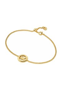 Pulsera de metal dorado con un diseño de cadena y un charm circular con un logotipo grabado. Ajustable con un pequeño cierre redondo.
