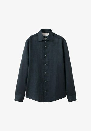 Chemise noire à manches longues avec boutons et col pointu, présentée à plat sur un fond blanc.