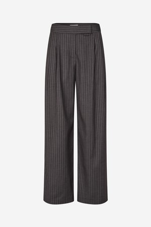 Wide-leg trousers in dark gray fabric with white pinstripes. Features a high waist and pleated front design for a tailored look.