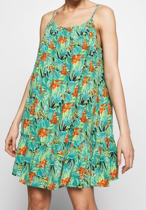 Sukienka bez rękawów z tropikalnym wzorem z pomarańczowymi kwiatami i zielonymi liśćmi, luźny fason, marszczony dół i cienkie ramiączka.