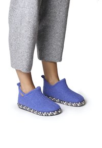 Blue felt slippers with a braided jute sole, featuring a soft, textured upper and a low-cut design for easy wear.